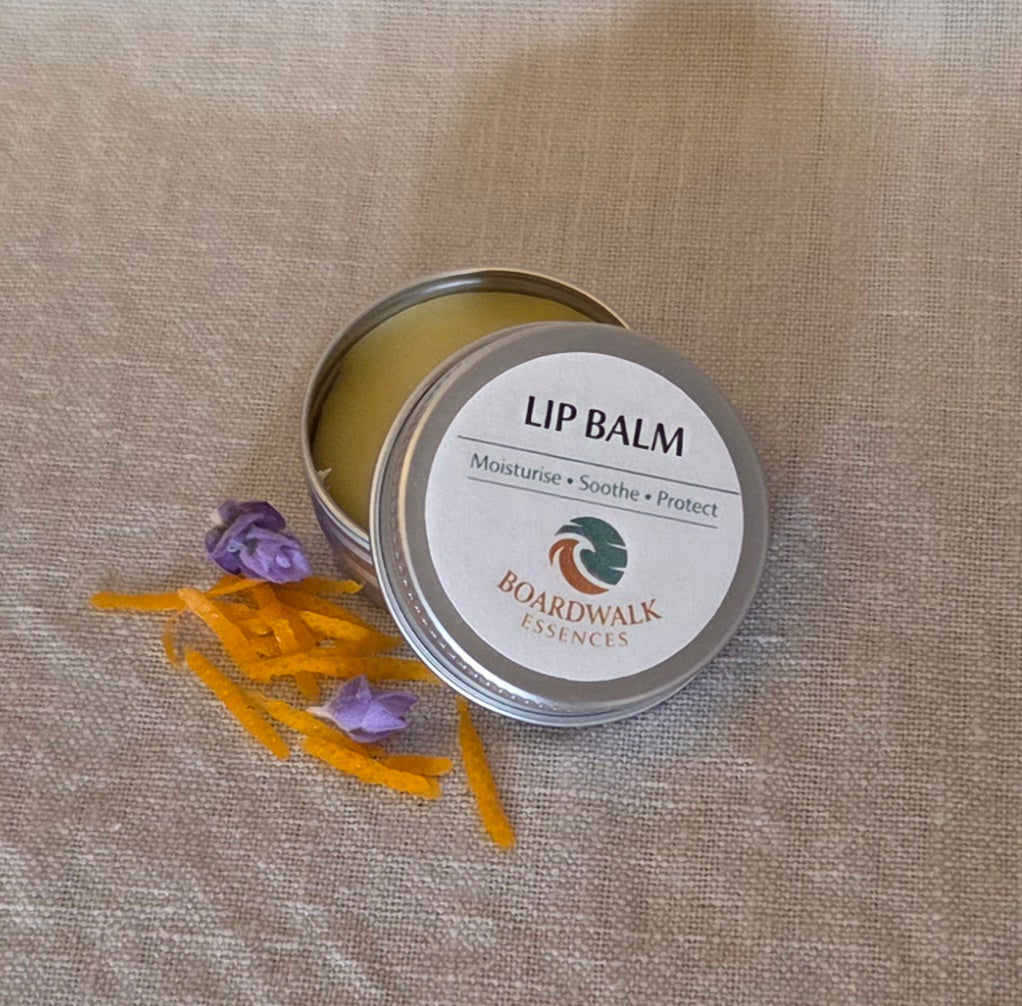 Lip Balm 15ml aluminium tin with cream label and gold border showing soft golden balm inside